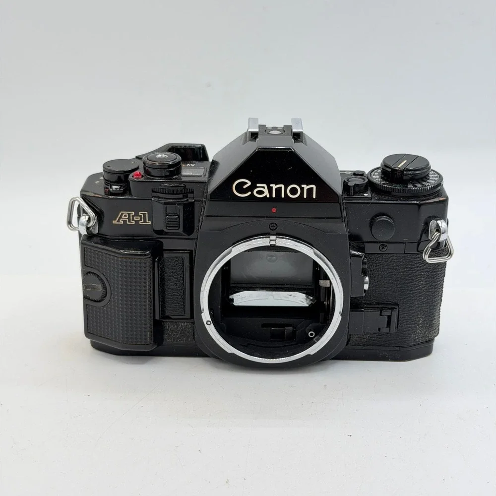 Lot of 2 Canon A-1 35mm SLR Film Camera Body Black Vintage Tested - For Parts